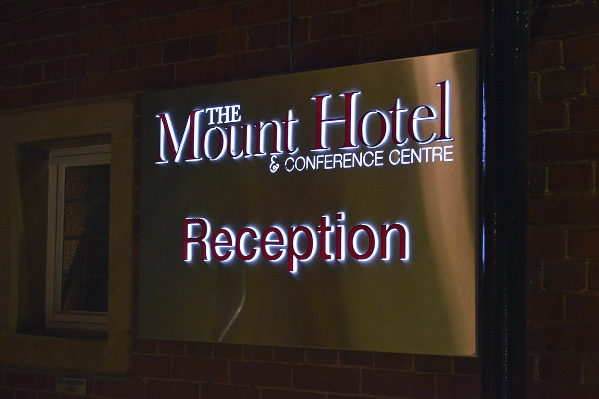 The sign at the main entrance - Mount Hotel